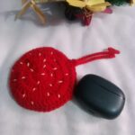 Handmade strawberry earbud case